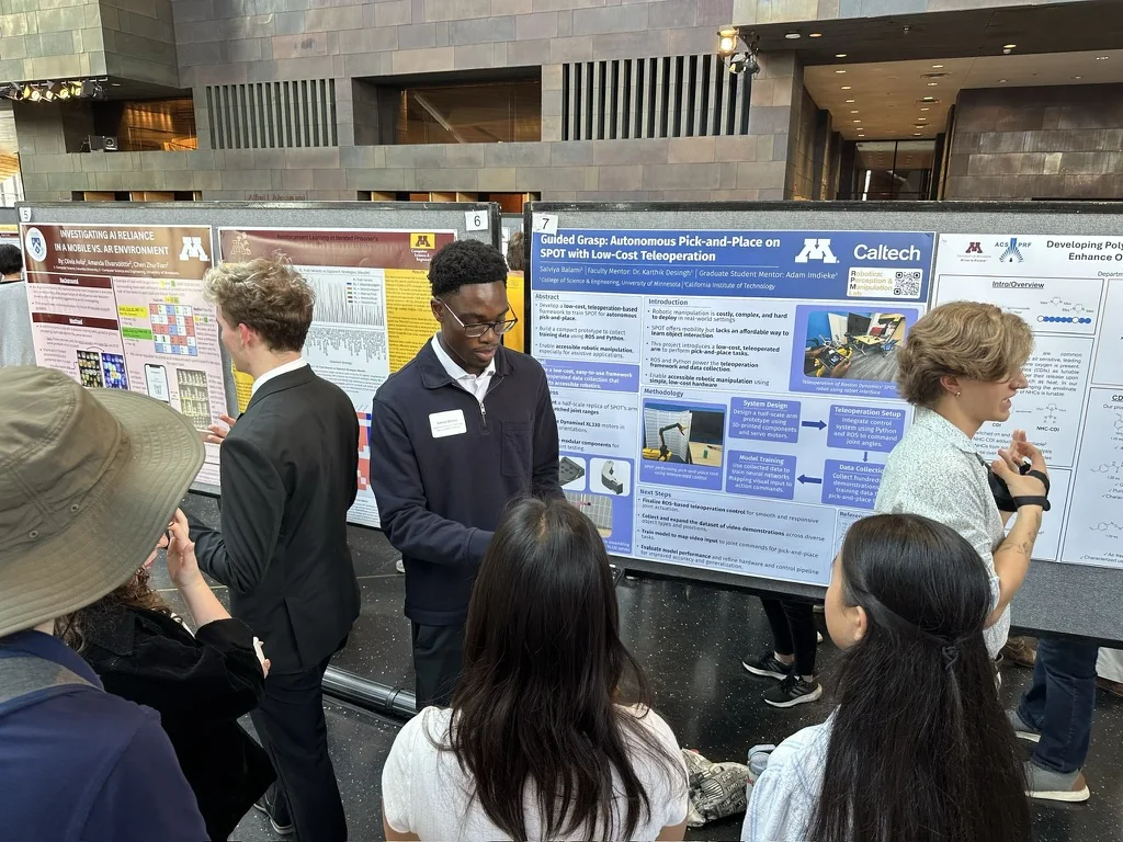 Salviya presenting his SPOT teleoperation research poster