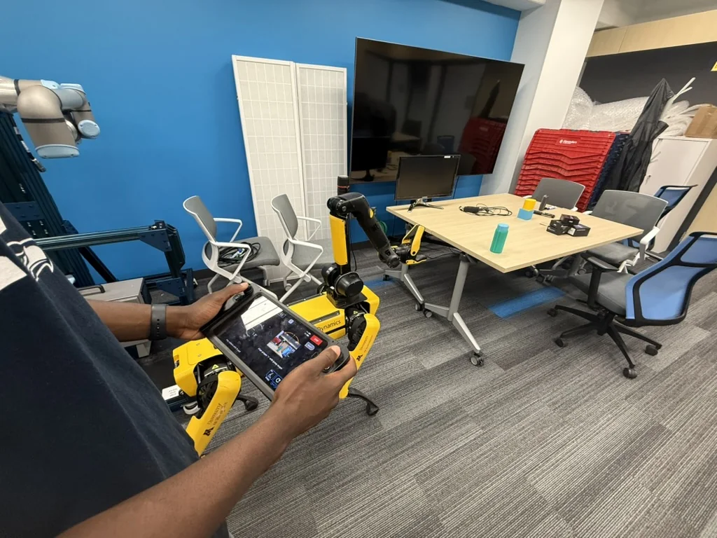 Salviya controlling a Boston Dynamics SPOT robot during teleoperation research